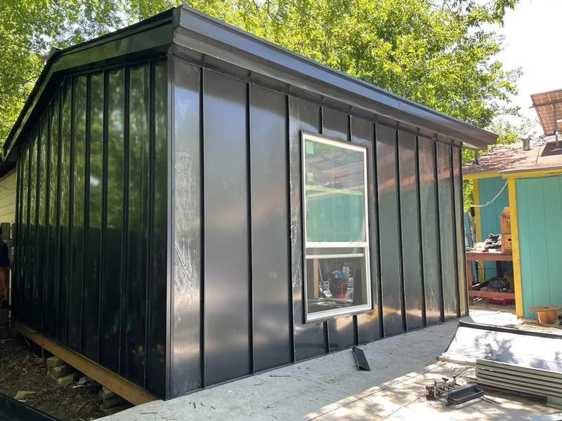 Black standing seam metal wall panels for Metal Roof Installation in Bellview